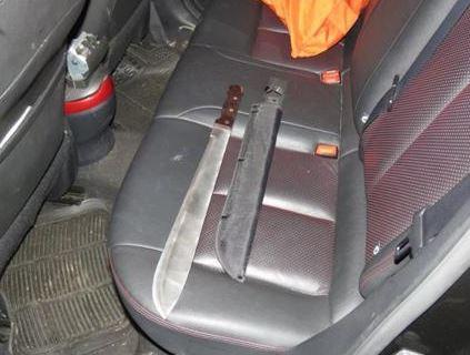  Marshall had a huge machete on him and another was on the back seat when cops stopped the gang's car