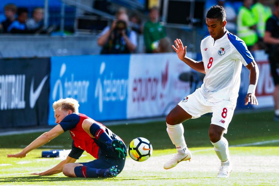  Panama's Joel Barcenas, right, and Norway's Birger Meling battle for the ball