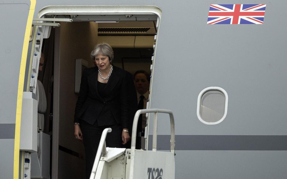  Theresa May appears startled by the personal attack from Donald Trump