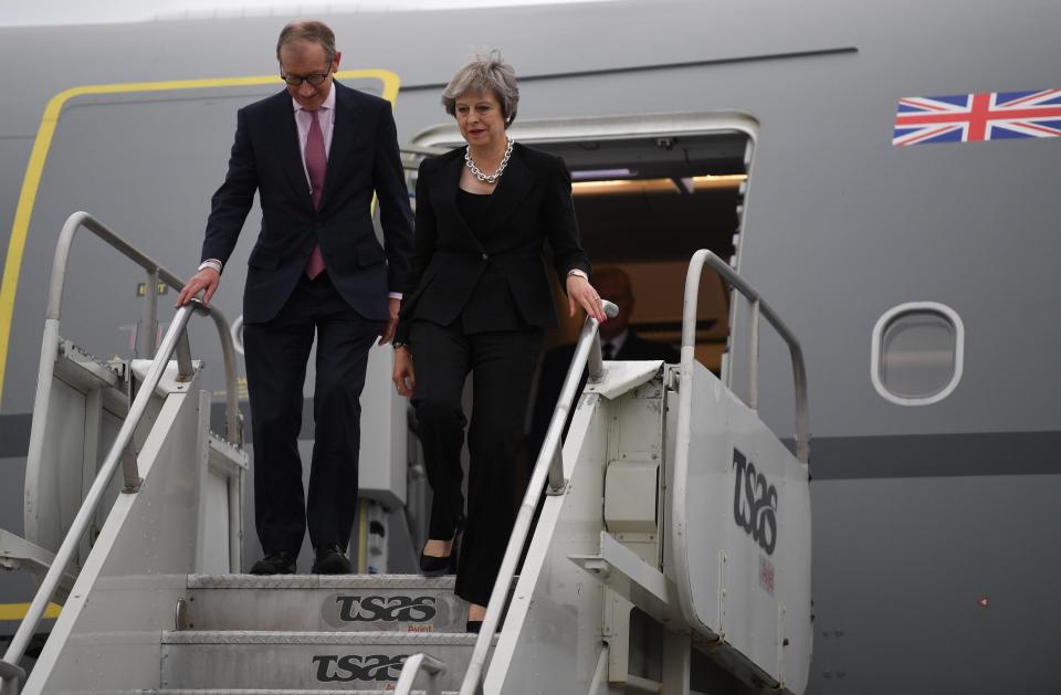  Theresa May and her husband Phillip arrive in Quebec... just as Boris' explosive comments were revealed