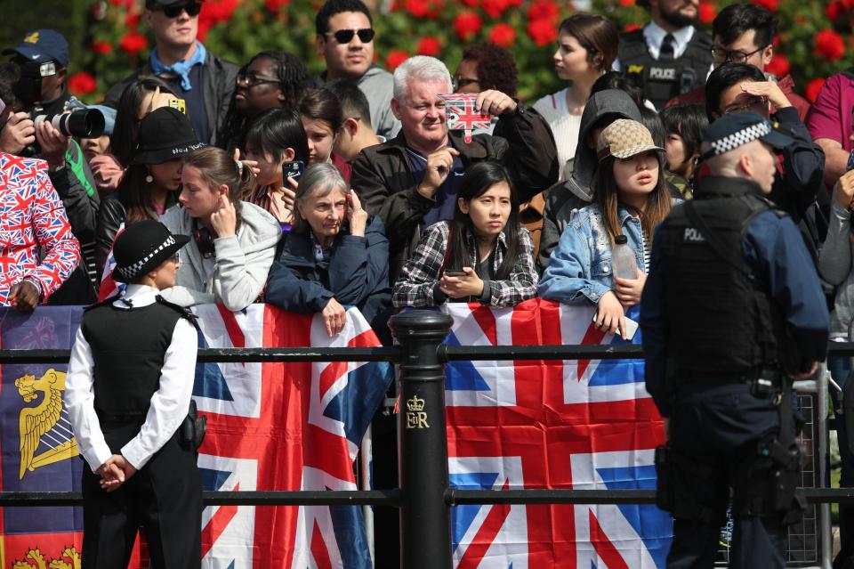  Members of The Household Cavalry ride past Buckingham Palace