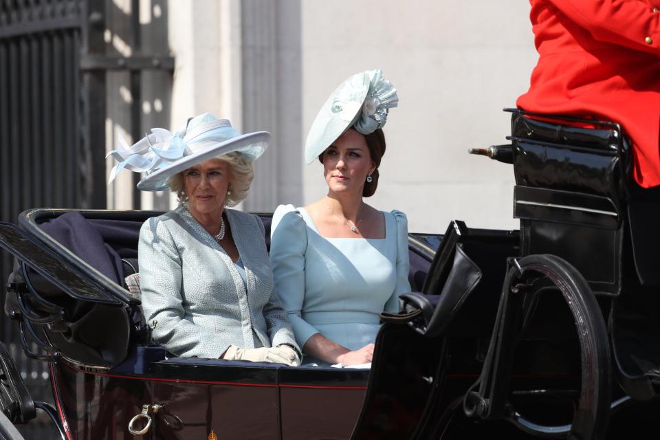  Camilla and Kate Middleton arrive in a carriage for the annual ceremony in central London