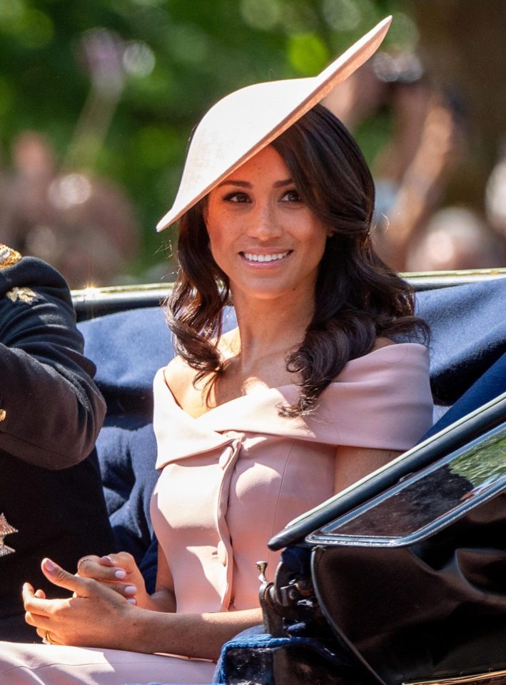  The Duchess of Sussex is wearing a dress by Carolina Herrera and a hat by Philip Treacy