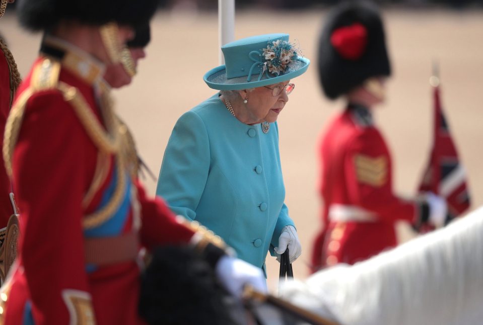  The Queen's procession was accompanied by a Sovereign's Escort of the Household Cavalry, made up of Life Guards and Blues and Royals