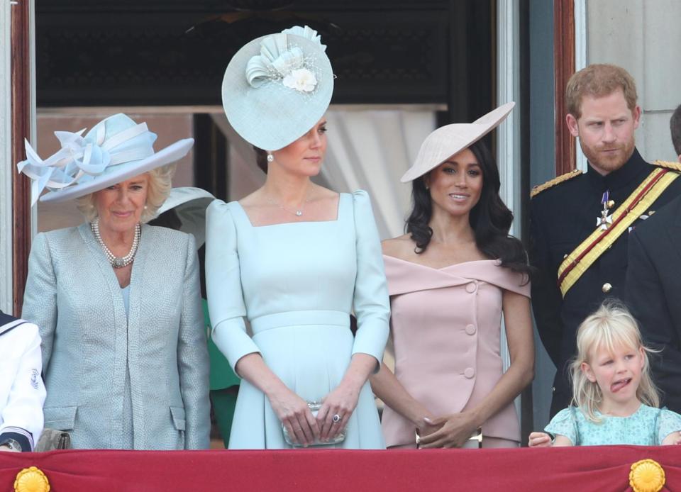  Meghan models the bespoke Carolina Herrera creation for her first balcony appearance