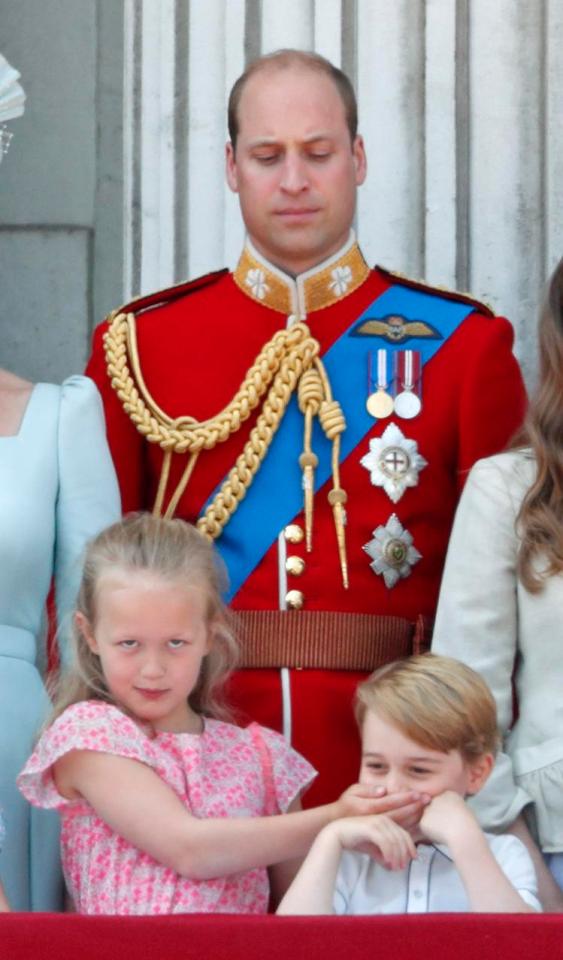  Prince William keeps a watchful eye on his son, next to Savannah Phillips