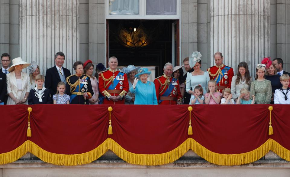  The Queen waves to the crowds as she was joined by the other royals for her official birthday