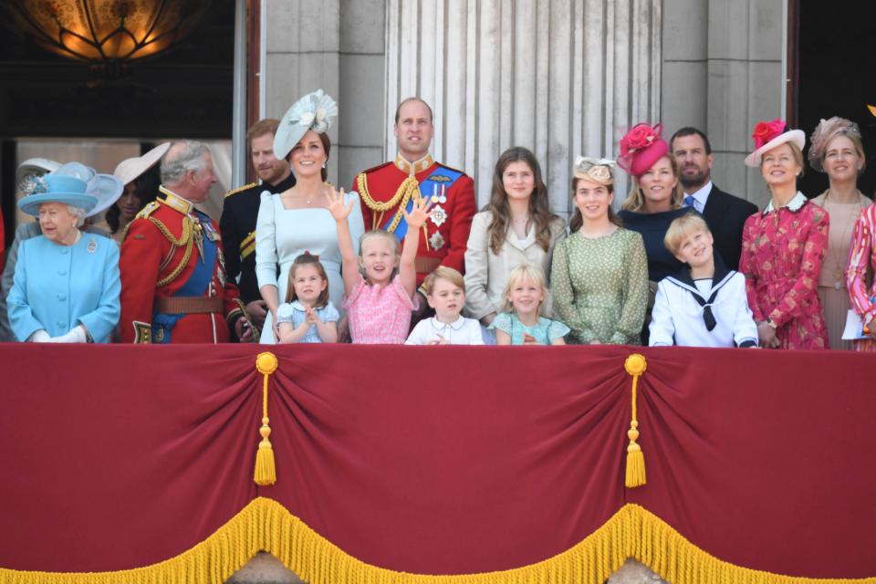  Savannah pictured throwing her arms in the air as she cheers during the historic moment