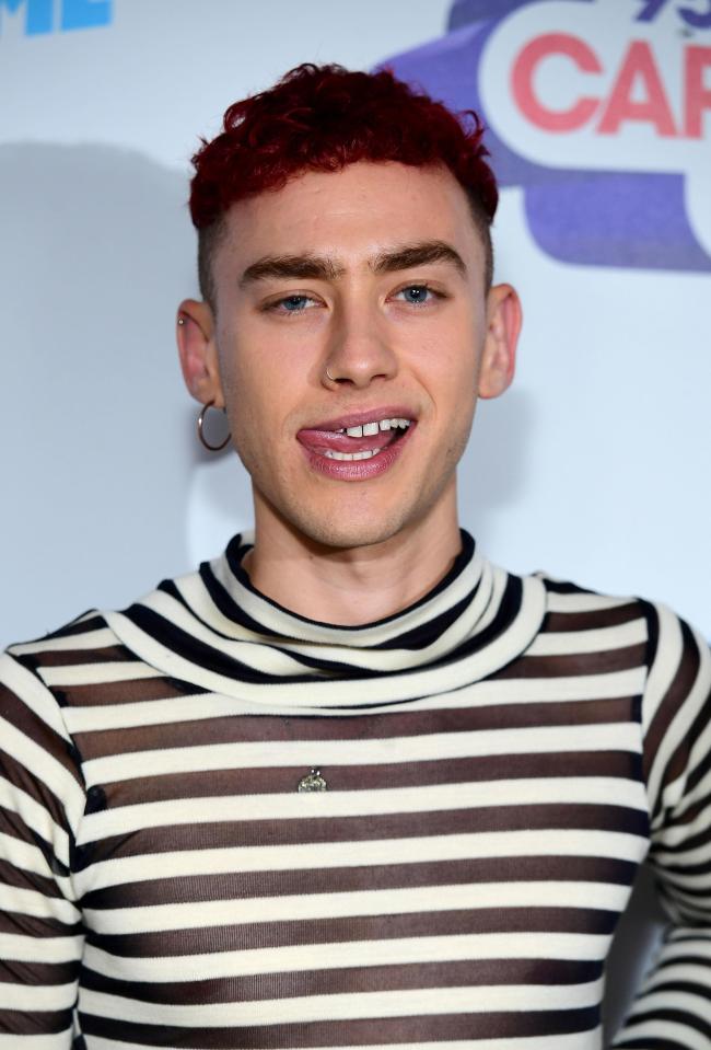  Olly Alexander donned a monochrome striped top before taking to the stage at Wembley Stadium