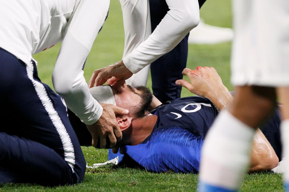  Medical staff raced onto the pitch to check over the striker