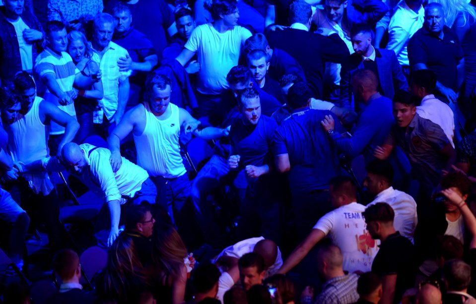  The brawl seemed to explode between two groups of men in the audience