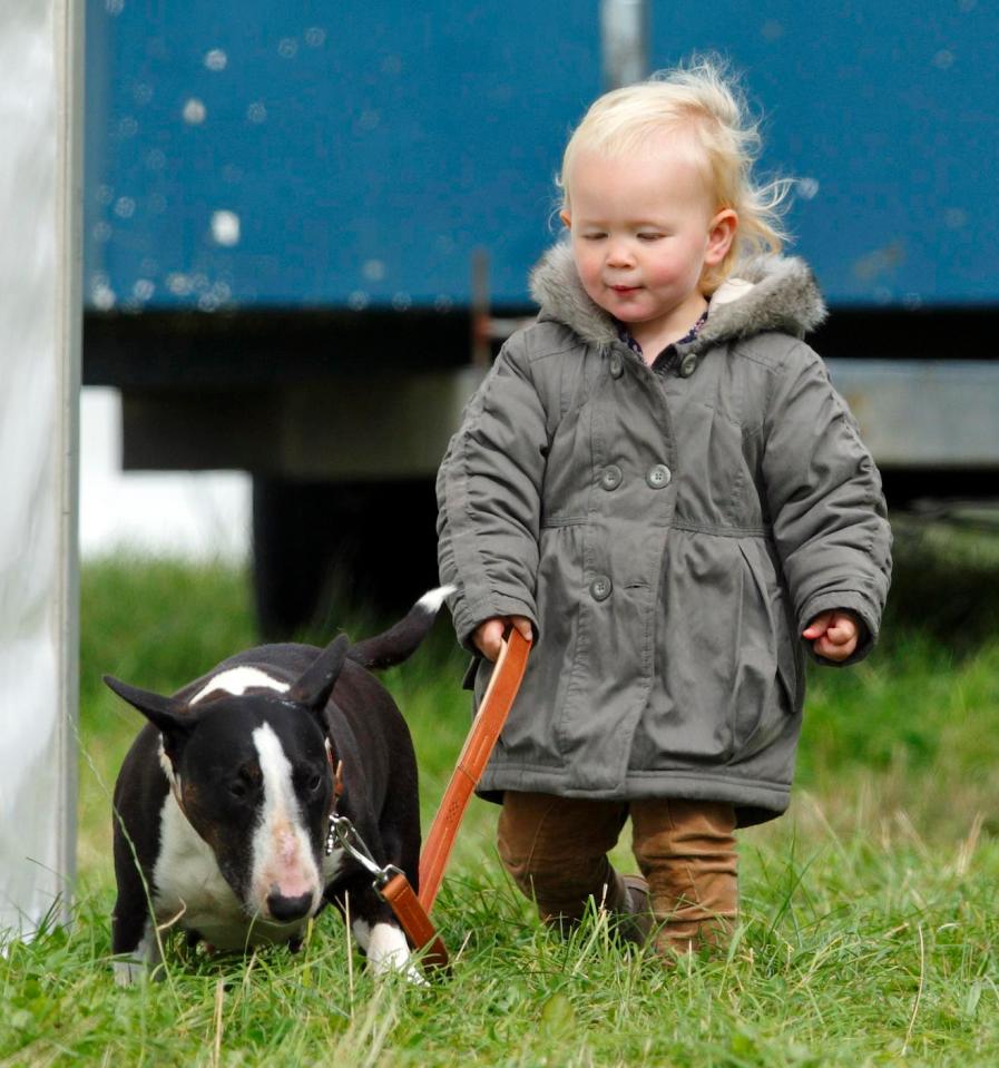  Savannah pictured with her grandmother's bull terrier when she was just two years old