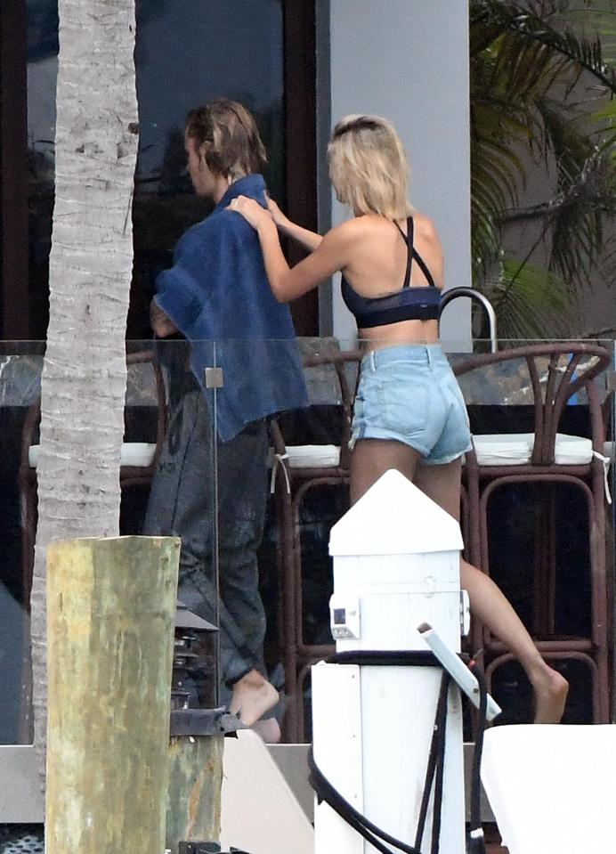  Hailey appeared to give Justin a quick massage after helping his dry off