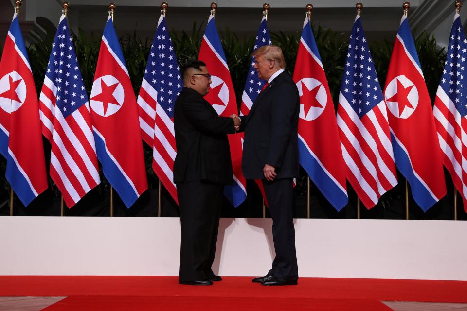  The world leaders share a historic handshake as they meet in Singapore