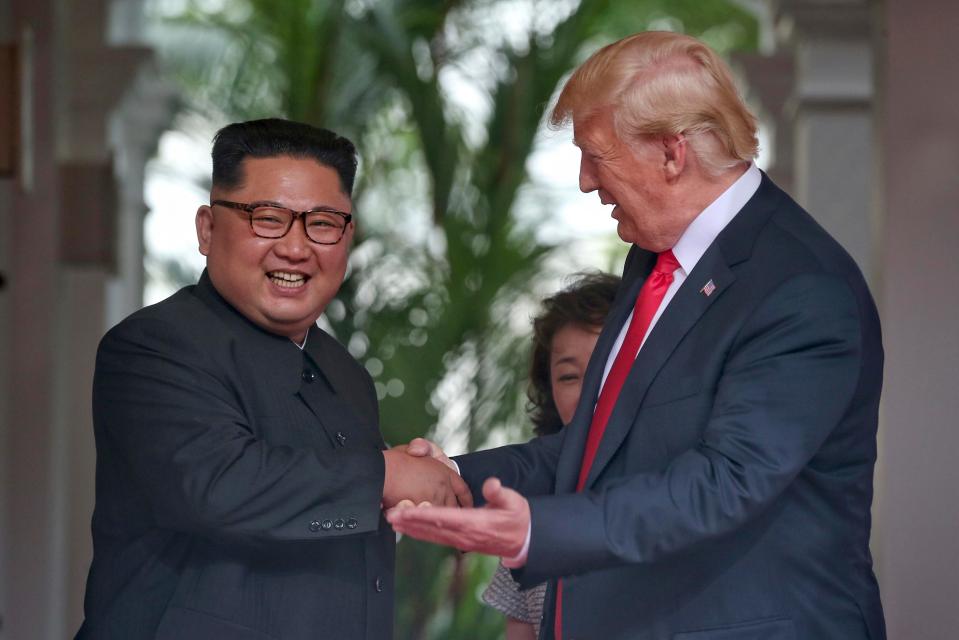  Trump used power poses to look strong and powerful while Kim seemed relaxed