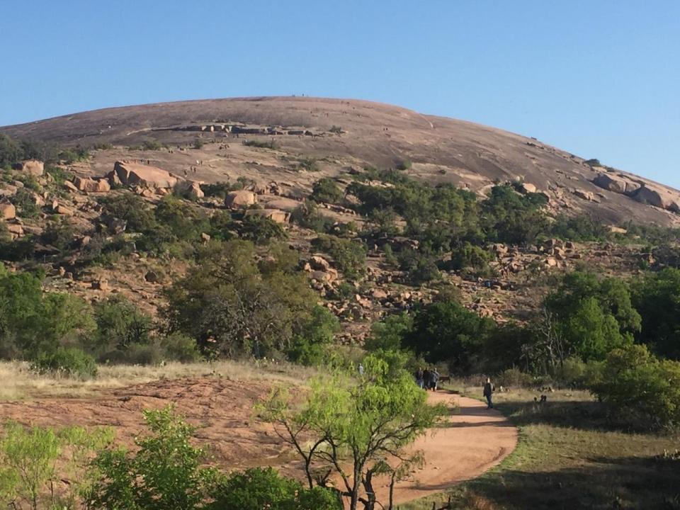  The 360-degree views of the Texan countryside from the summit of pink-granite Enchanted Rock made the 1,825ft climb worth every gasping breath