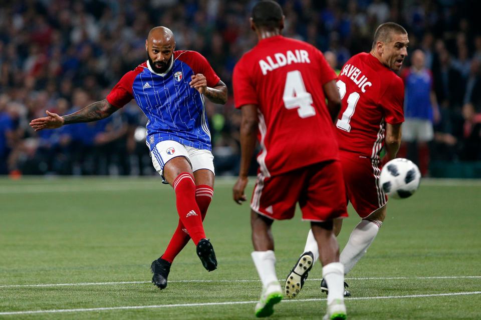  Thierry Henry produced a trademark finish to score for France