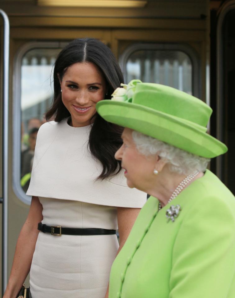 Meghan Markle smiled as the Queen as they arrived for their trip to Cheshire today