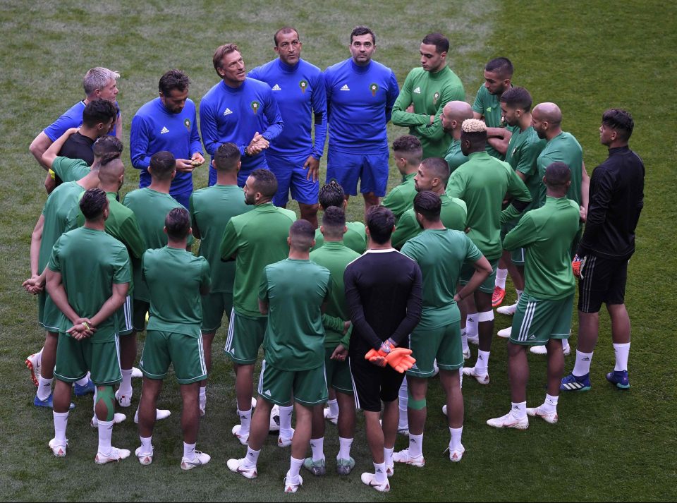  Morocco coach Herve Renard hands outs instructions before their vital group opener with fellow underdogs Iran