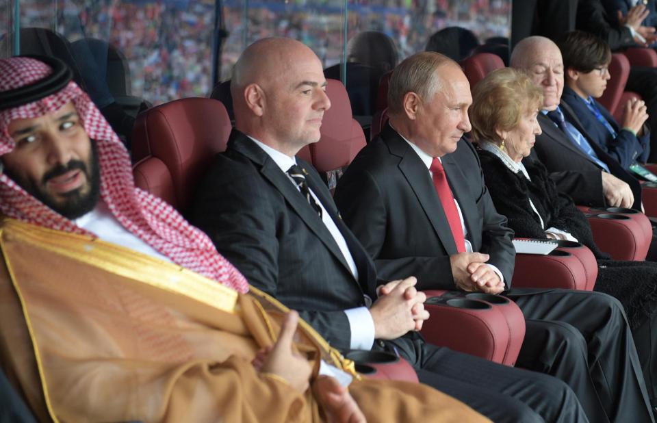  Vladimir Putin (third from left) watched alongside Fifa president Gianni Infantino (second from left)