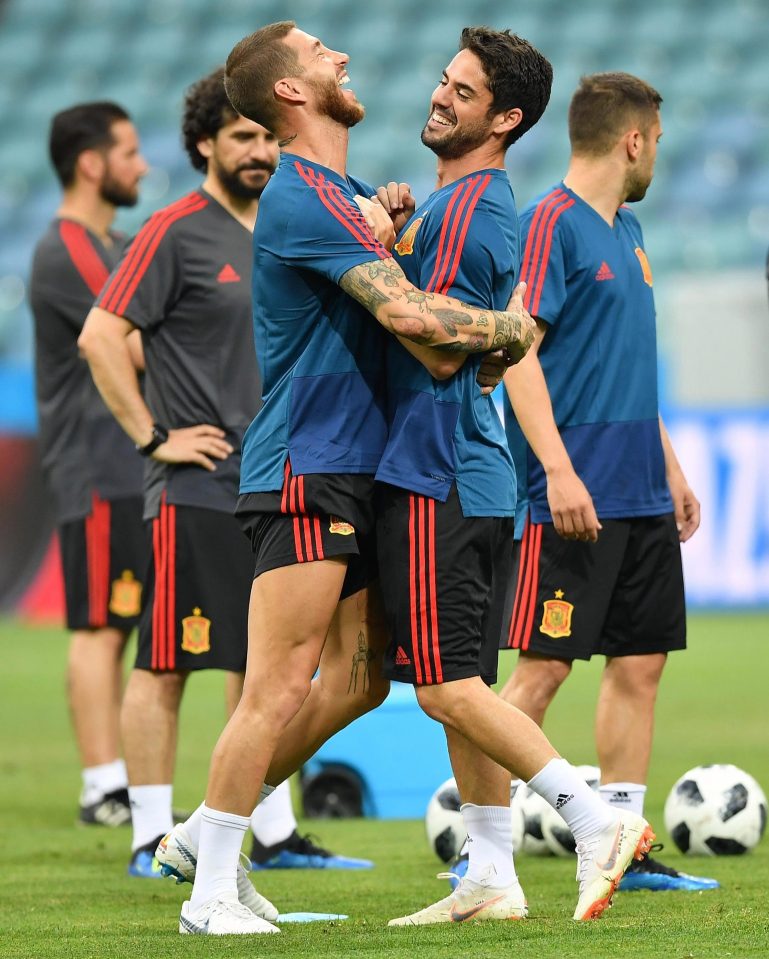  Spain's Sergio Ramos and Sergio Busquets add a personal touch to training