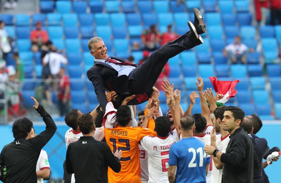 Carlos Queiroz was thrown in the air by his players