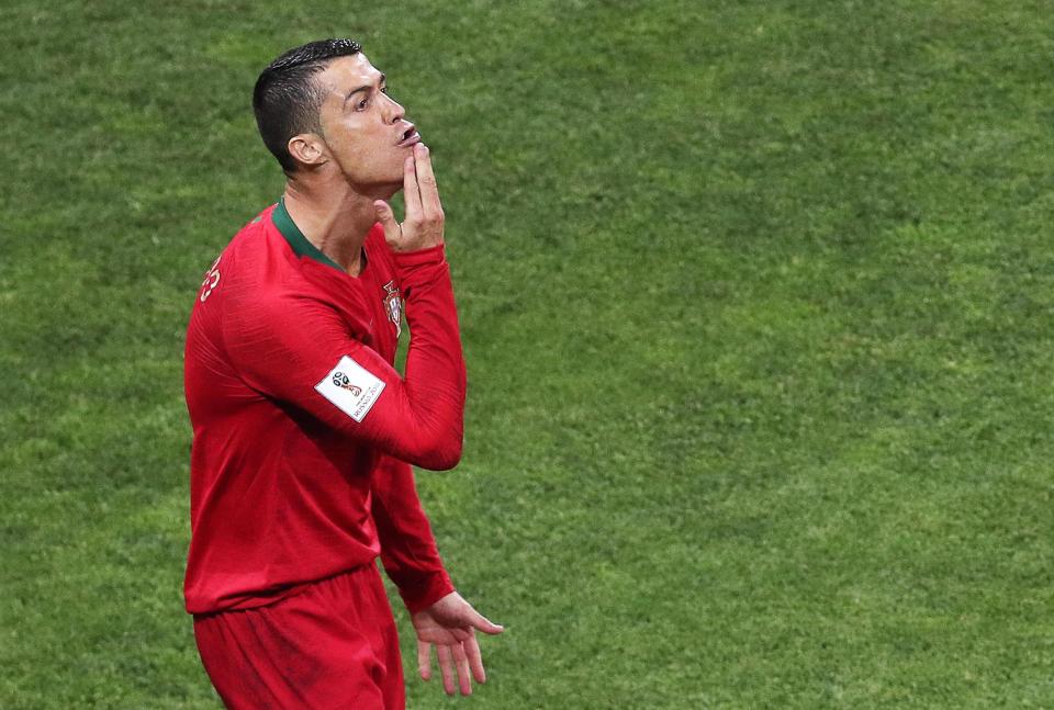  Cristiano Ronaldo appears to make a goatee gesture during his incredible one-man show against Spain