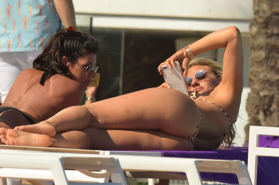  Danielle could be seen relaxing by the pool in Ibiza