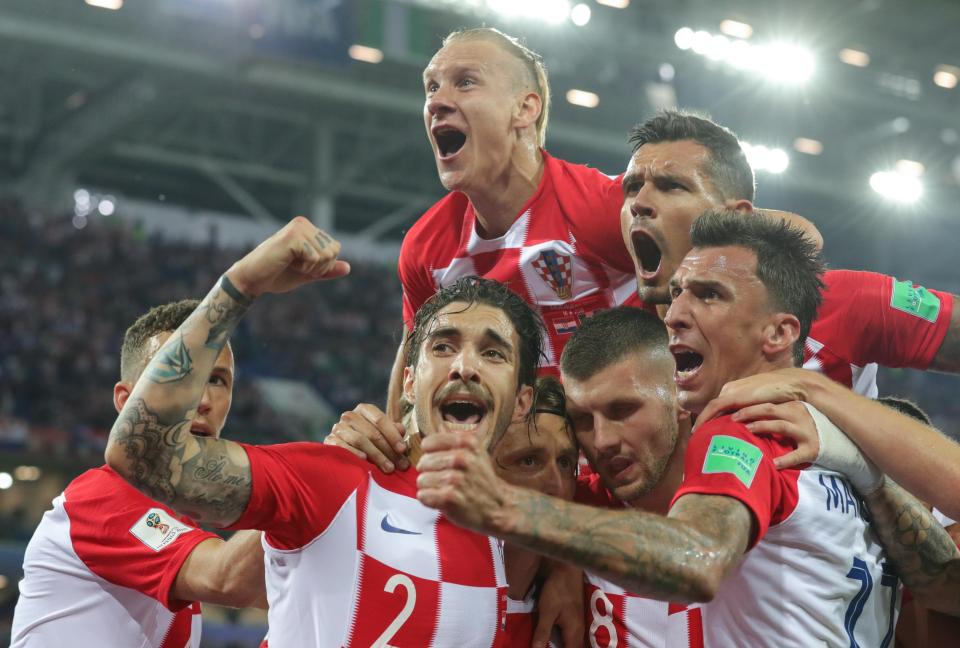  Croatian players celebrate after Luka Modric seals victory against Nigeria