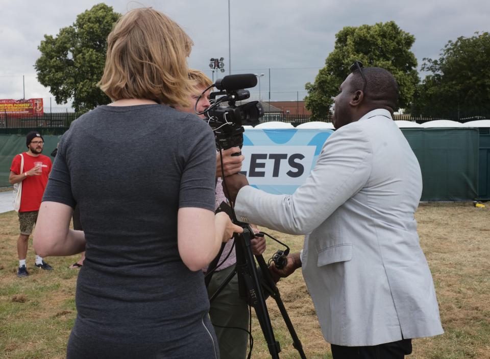  Mr Lammy grapples with The Sun's camera during an interview