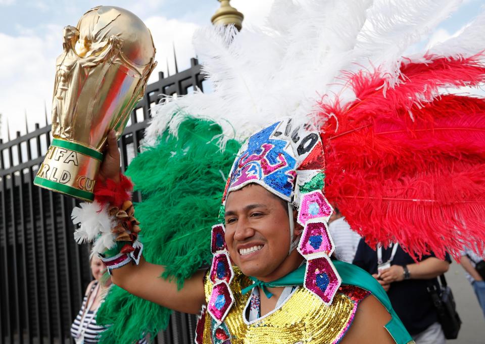  Another fan wore an ancient Mayan-style headdress