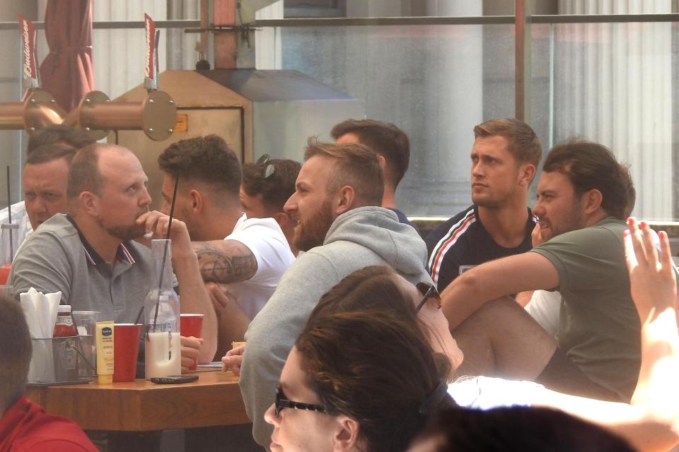  The former Towie star was seen watching the footie with male friends