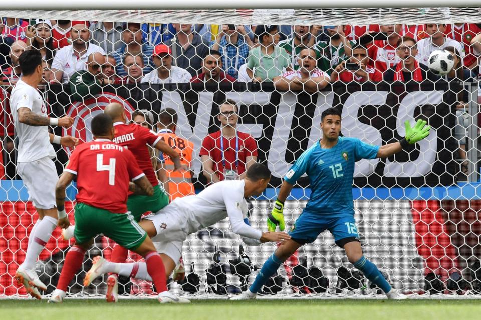  Cristiano scores the winning header for Portugal as they beat Morocco 1-0 in Moscow