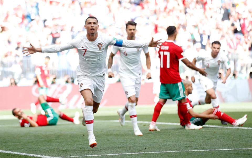  The Portugal forward celebrates after heading to the top of the World Cup scoring charts