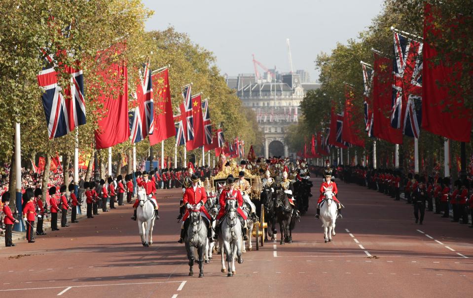  Queen Elizabeth II and China's president  Xi Jinping during his state visit in 2015... a small number of mostly Chinese people demonstrated against the visit over blatant human rights abuses carried out by the Communist regime