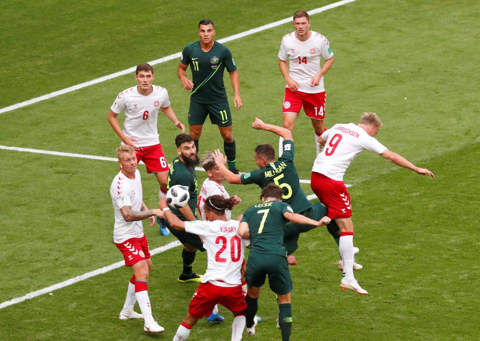  Denmark were unfairly penalised when Mathew Leckie's header struck Yussuf Poulsen's hand