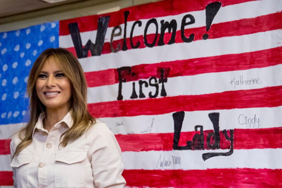  Melania was greeted by the children who had made a US flag saying 'welcome first lady'