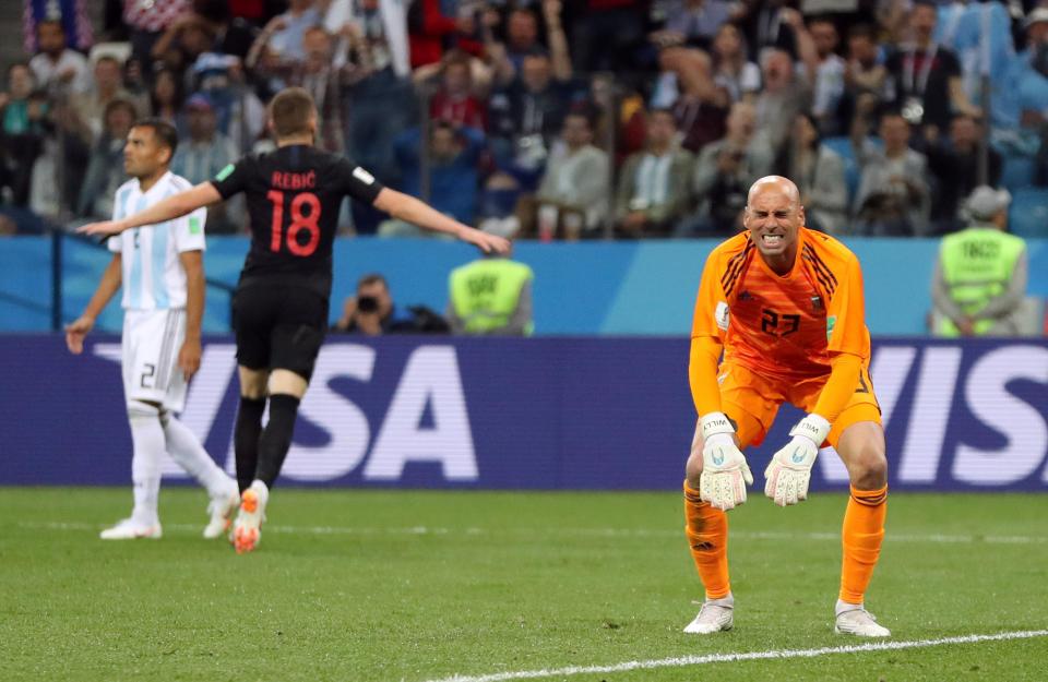  Willy Caballero reacts to his howler that allowed Croatia to score