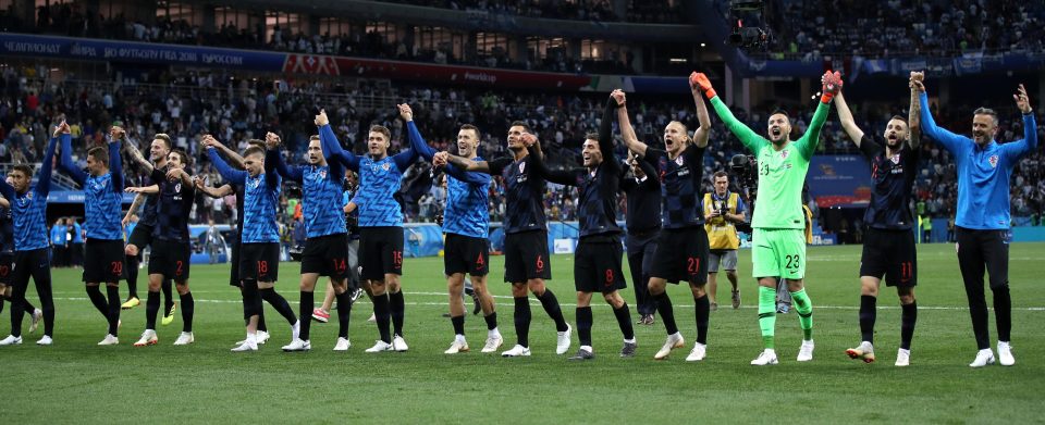  Croatia's players celebrate reaching the knockout stages