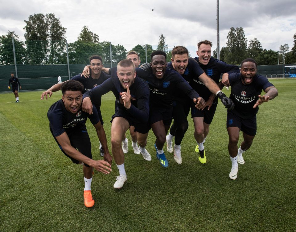  Jesse Lingard larks around in training with the England squad