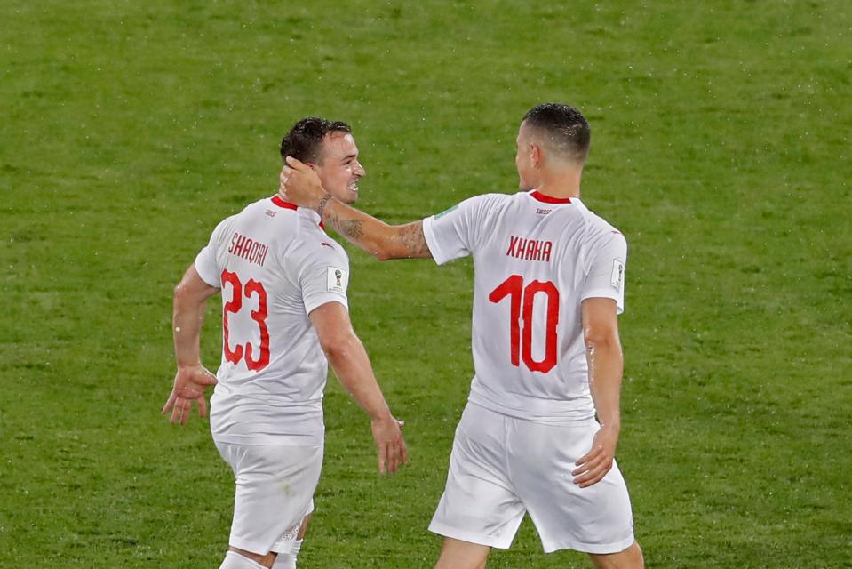  Xherdan Shaqiri, left, and Granit Xhaka both scored and celebrated with a controversial hand symbol