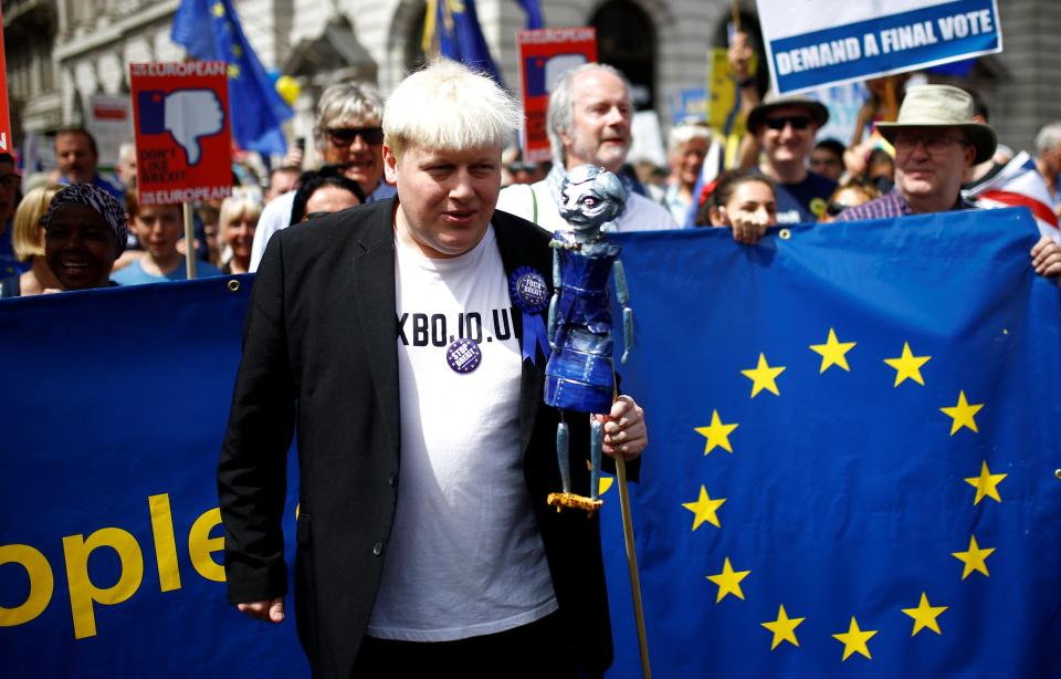  A Boris Johnson lookalike is among those taking part in the march