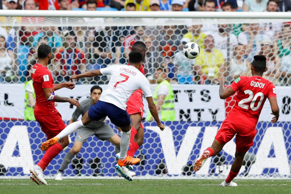  Jesse Lingard sends his shot curling into the top corner as England run riot in Russia