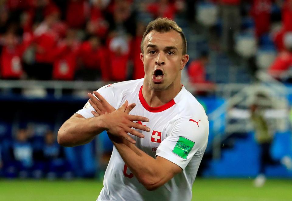  Xherdan Shaqiri celebrates after scoring his side's second goal in Russia