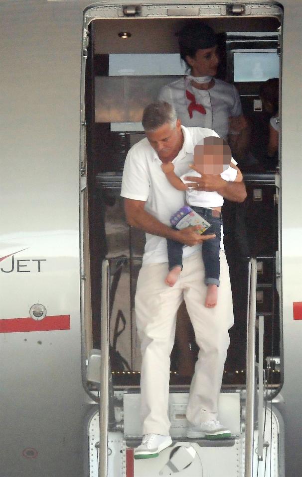 George and wife Amal touched down in Sardinia with their 10-month-old twins Alexander and Ella last month