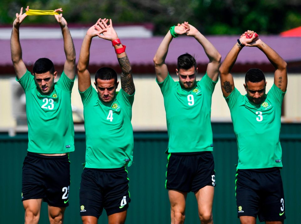  Tomas Rogic, Tim Cahill, Tomi Juric and James Meredith warm up to take on South American flops Peru - with a last 16 place at stake