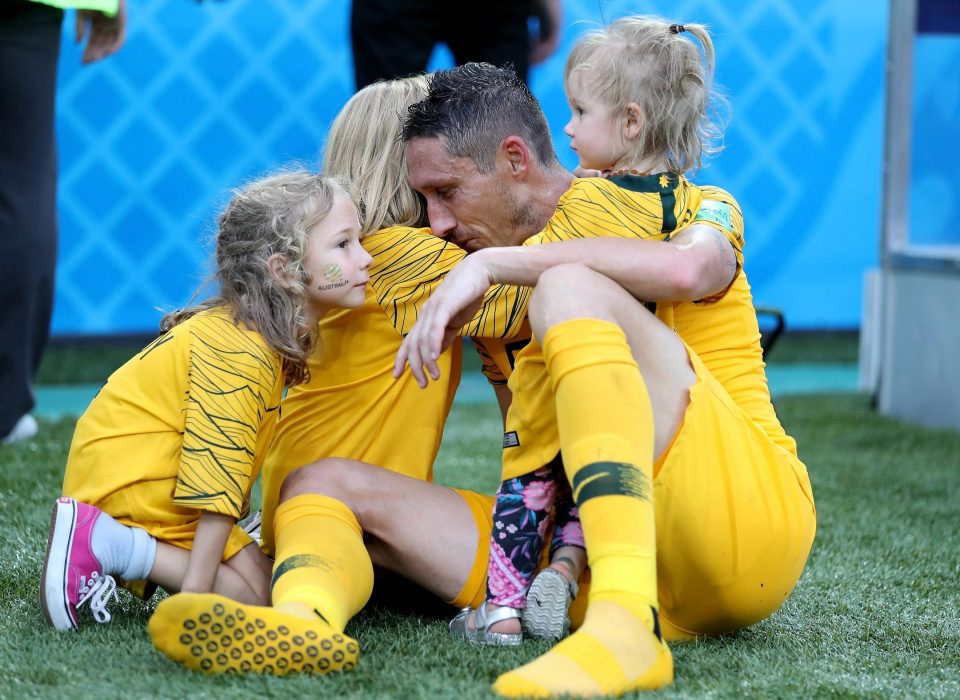 Australia were dumped out of the World Cup having failed to win a single game - Mark Milligan has his kids to help him round