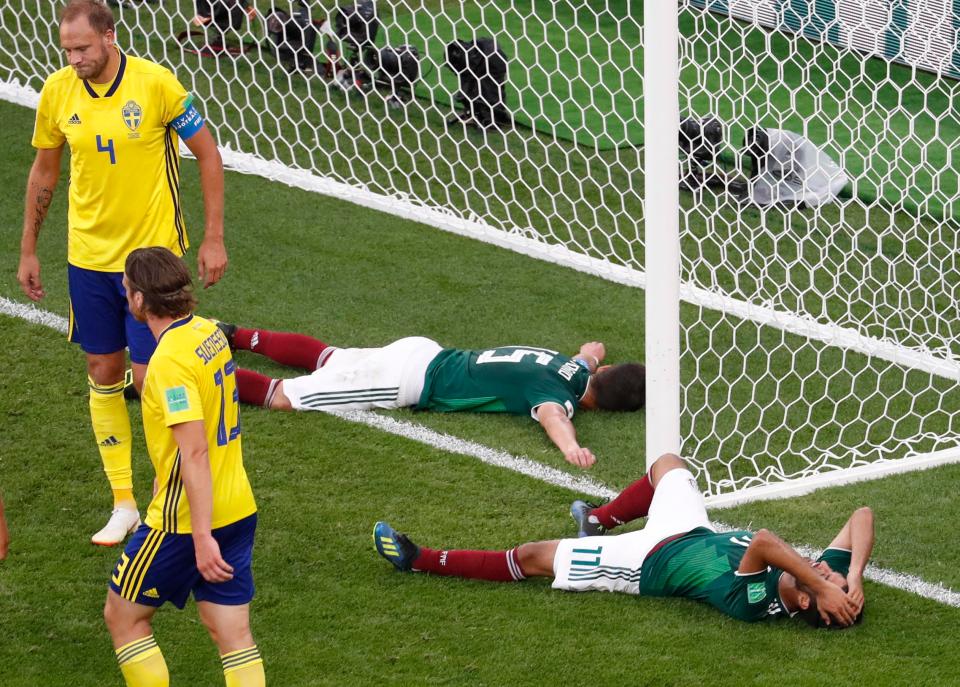  Mexico were beaten 3-0 by Sweden but progressed after Germany's defeat