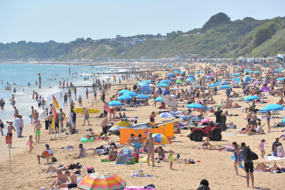 The sand at Bournemouth was covered in beachgoers eager to cool off in today's heat