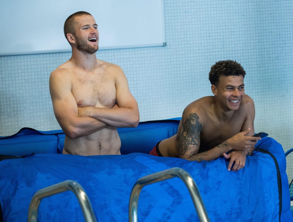  Eric Dier and Dele Alli recover in an ice bath during the session